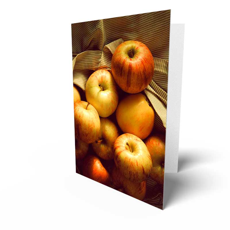 Folded greeting cards with the ability to include text on the inside as well as an image or logo on the back. Each card is accompanied by a plain white envelope.
